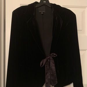 Long sleeve, faux velvet jacket. Beautiful tie detail.